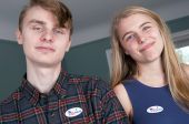 boy and girle voting for the first time